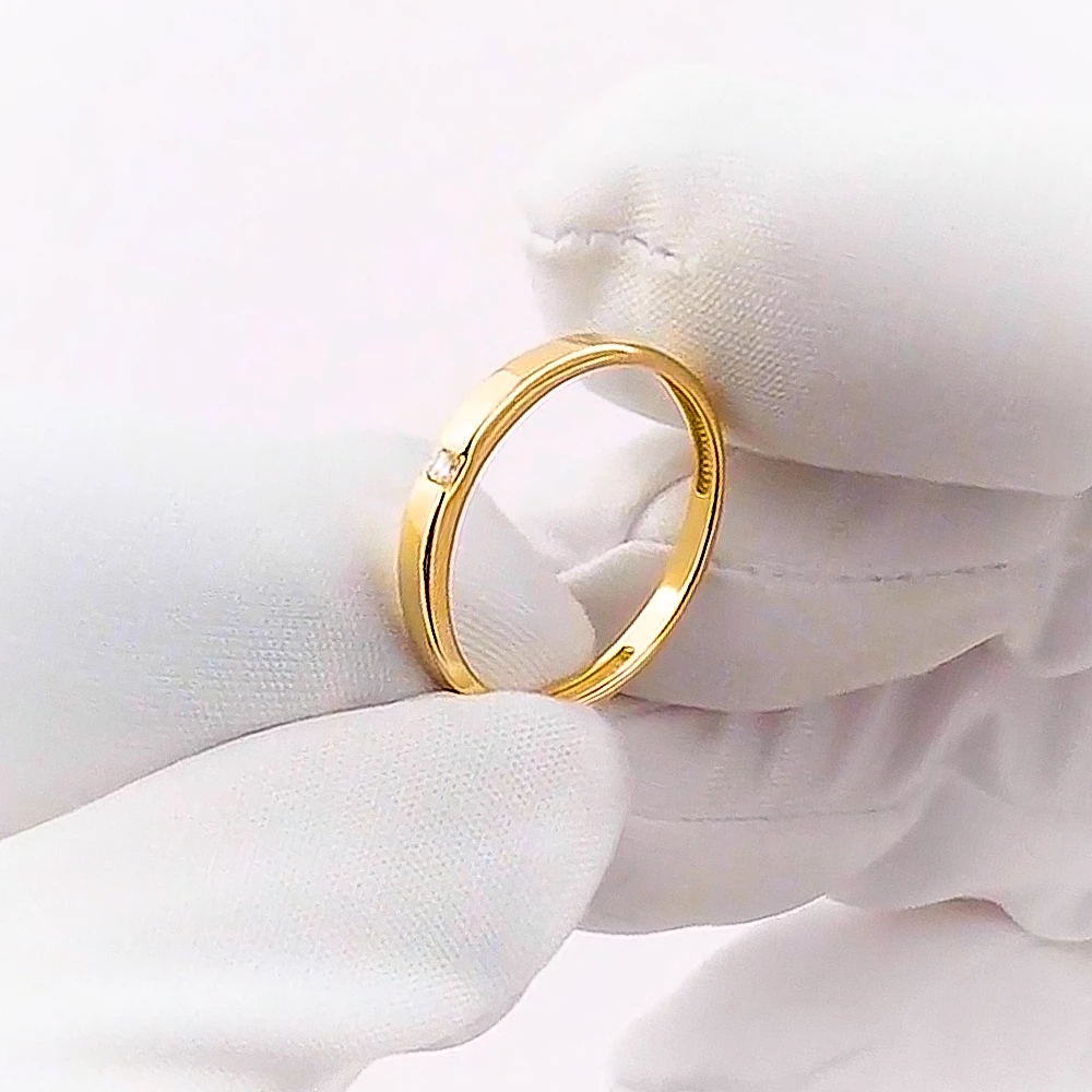 Кольцо обручальное с бриллиантом из красного золота 375 пробы
